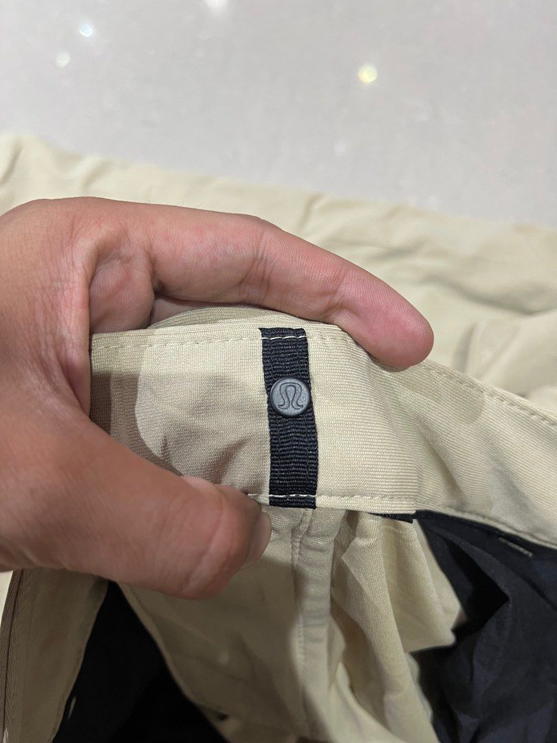 Lululemon Golf Pants Beige Men's Size (Category: Trousers) located in Caloocan City. Submitted by pumarenluc79160 (Listing ID 1463809694, Image 2). Description: - Beige Lululemon pants - Ideal for golf or casual wear - Comfortable and movement-friendly material - Features button closure and pockets - Versatile for everyday use.