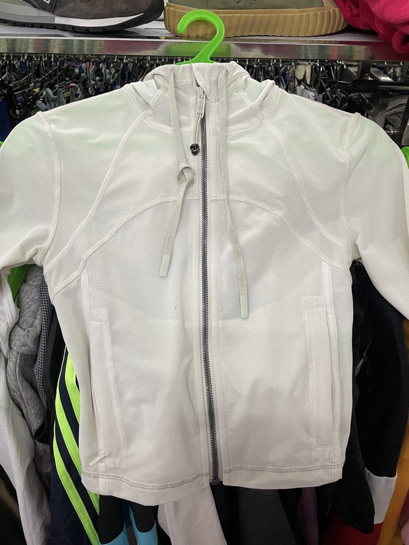 Lululemon White Hooded Lightweight Jacket (Category: Coats, Jackets and Outerwear) located in Lucena. Submitted by riyizthriftz (Listing ID 1463892484, Image 2). Description: - White Lululemon jacket - Lightweight material, perfect for layering or light workouts - Features front pockets - Full front zipper closure - Minor faint marks on the front, clearly shown in photos.