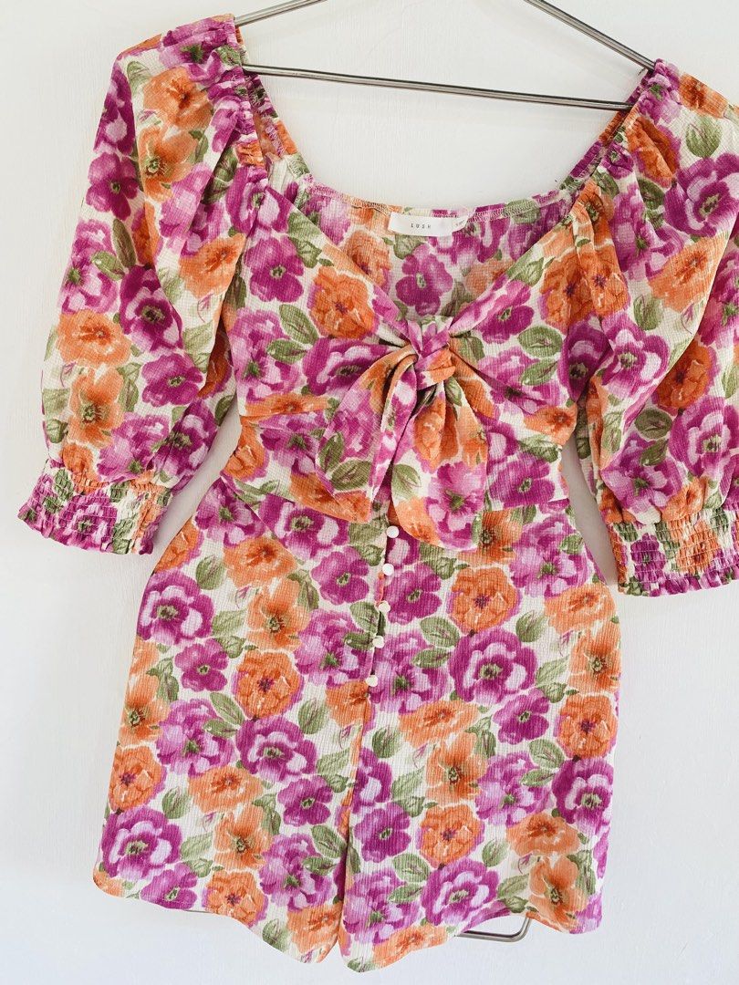 LUSH Floral Tie Front Romper (Category: Rompers) located in Vigan. Submitted by yourcloset1001 (Listing ID 1463912728, Image 3). Description: - Brand: LUSH - Style: Floral Romper - Features: Tie front detail, square neckline, puff sleeves with elastic cuffs - Closure: Button front - Occasion: Perfect for day outs, casual events, and summer wear.
