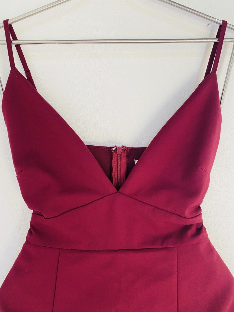 Luvalot Burgundy V-Neck Romper (Category: Rompers) located in Vigan. Submitted by yourcloset1001 (Listing ID 1463912179, Image 2). Description: - Burgundy V-neck romper - Spaghetti straps - Back zipper closure - Cinched waist with band - Slightly flared shorts - Ideal for night outs or parties.