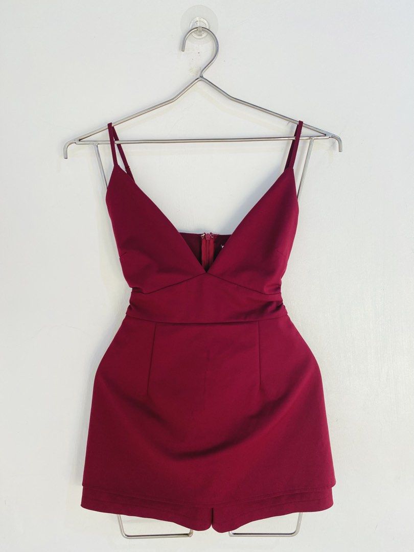 Luvalot Burgundy V-Neck Romper (Category: Rompers) located in Vigan. Submitted by yourcloset1001 (Listing ID 1463912179, Image 1). Description: - Burgundy V-neck romper - Spaghetti straps - Back zipper closure - Cinched waist with band - Slightly flared shorts - Ideal for night outs or parties.