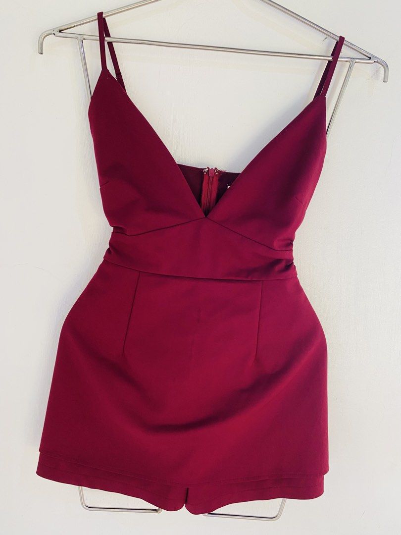 Luvalot Burgundy V-Neck Romper (Category: Rompers) located in Vigan. Submitted by yourcloset1001 (Listing ID 1463912179, Image 3). Description: - Burgundy V-neck romper - Spaghetti straps - Back zipper closure - Cinched waist with band - Slightly flared shorts - Ideal for night outs or parties.