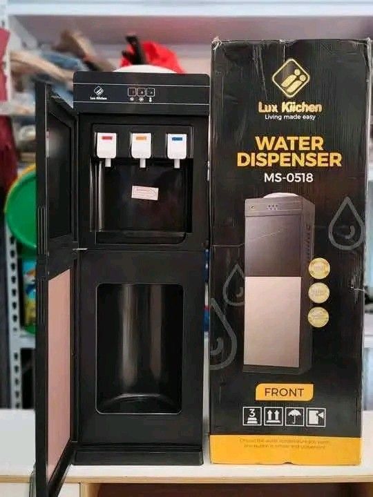 Lux Kitchen MS-0518 Water Dispenser (Category: Water Purifiers & Dispensers) located in Manila. Submitted by berdenmarl01688 (Listing ID 1463929952, Image 3). Description: - Lux Water Dispenser Model MS-0518 - Offers Hot, Cold, and Room Temperature water options - Features a convenient bottom storage compartment - Comes with its original packaging - Perfect for both home and office environments.