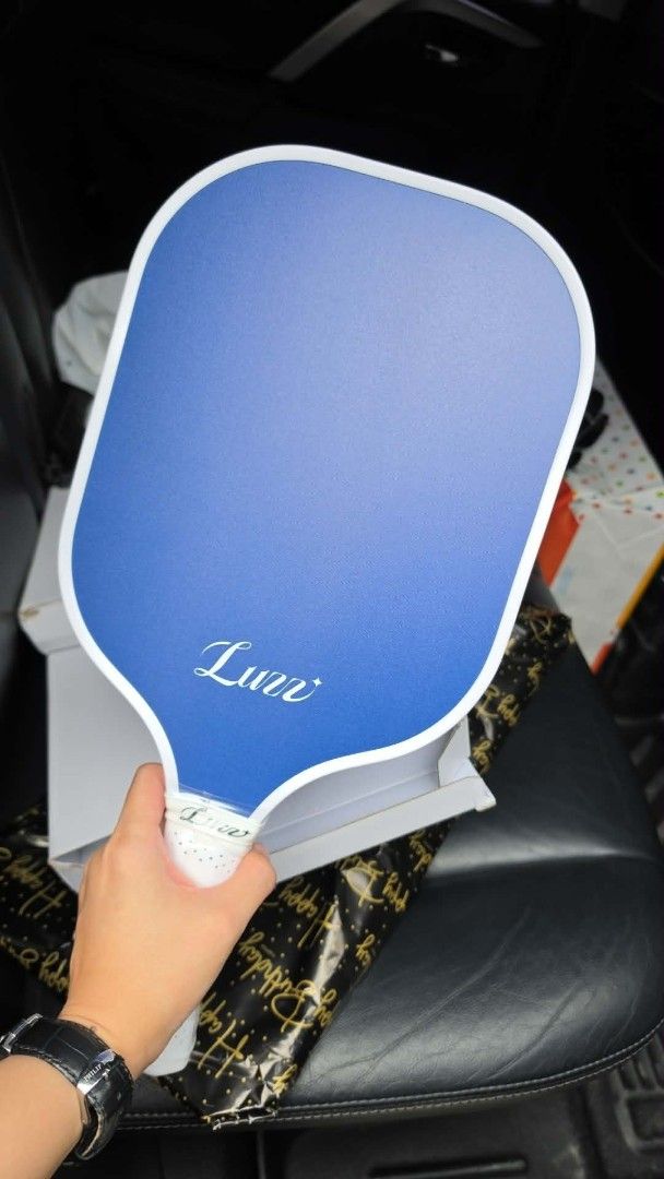 Luzz Pickleball Paddle USA Approved (Category: Racket and Ball Sports) located in Manila. Submitted by reaangelic70519 (Listing ID 1463779446, Image 1). Description: - Luzz pickleball paddle - Luzz Fog Original - Stylish blue and white design - USA Pickleball approved for official play - Includes original packaging - Perfect for enjoying pickleball games - Free balls.