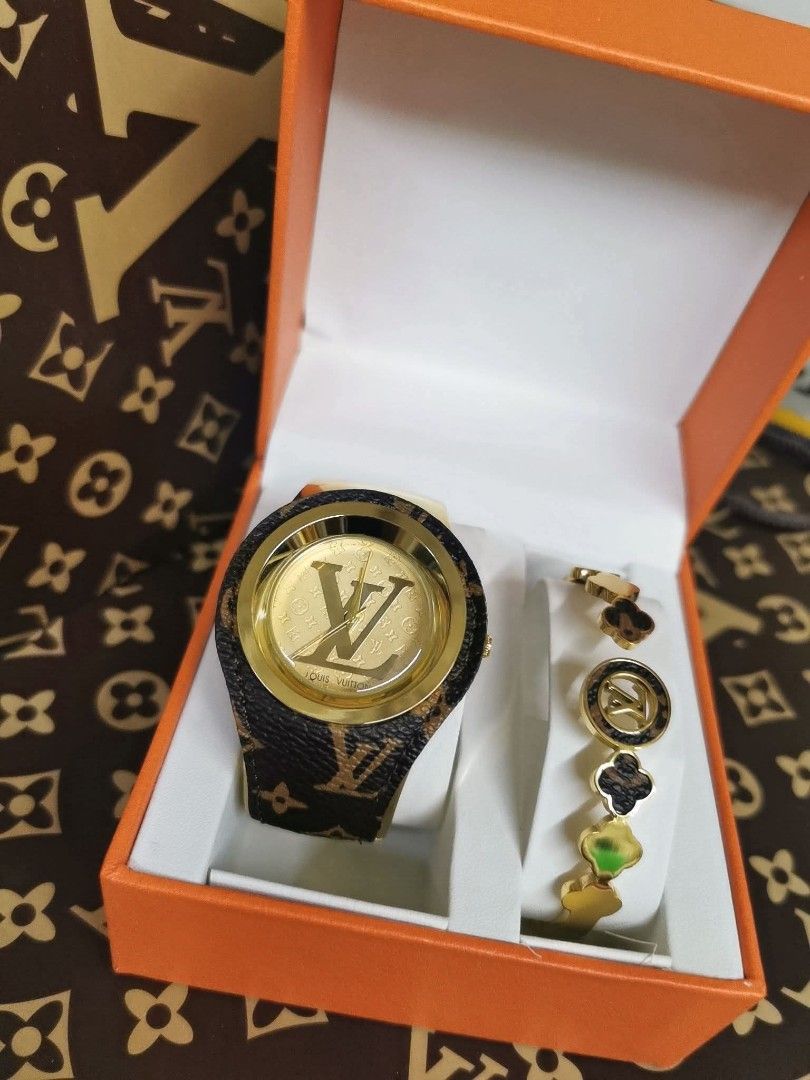 LV WATCH SET (Category: Luxury Watches) located in Manila. Submitted by ddg_s (Listing ID 1463807474, Image 2). Description: TOP TIER QUALITY ₱2000 set (with bangle) w/h box and paper bag Baterry Operated/stainless steel water resistant JPN MOVEMNT ACTUAL PICTURE.