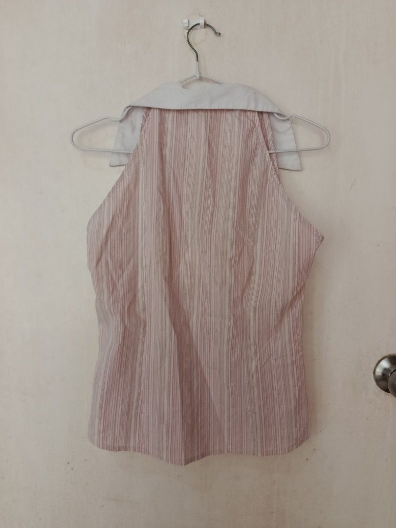 Maldita Striped Sleeveless Collared Top Size M (Category: Sleeveless) located in Manila. Submitted by tyrrachuuu (Listing ID 1463769238, Image 2). Description: - Maldita top - Size: Medium (M) - Pattern: Pink and white stripes - Design: Sleeveless with a collar - Closure: Button-up front - Versatile: Great for casual wear or dressing up.