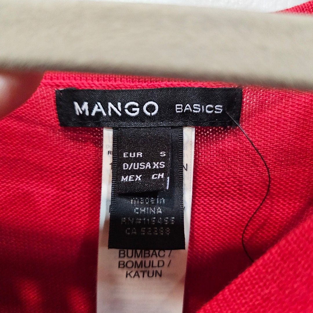 Mango Basics Red Short Sleeve T-shirt (Category: Shirts) located in Makati City. Submitted by goldenbird.001 (Listing ID 1463854836, Image 2). Description: - Brand: Mango Basics - Color: Red - Sleeve Length: Short Sleeve - Material: Comfortable fabric - Origin: Made in China - Size: S - Style: Simple and comfortable, perfect for everyday wear - Pairing: Easily matches with jeans or shorts.