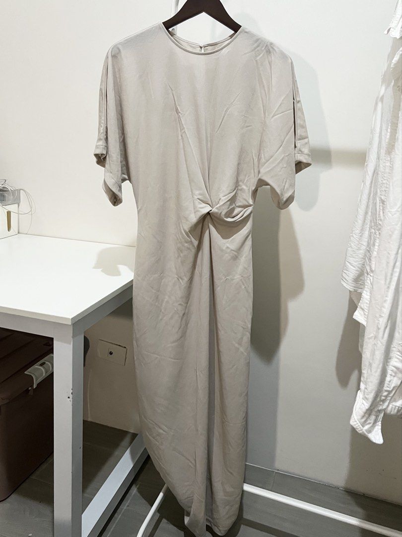 MANGO Beige Twist Front Midi Dress (Category: Dresses) located in Quezon City. Submitted by styleandcomfort (Listing ID 1463827220, Image 1). Description: Used once only Original price is around 2,000 Message me for inquiries 😊.