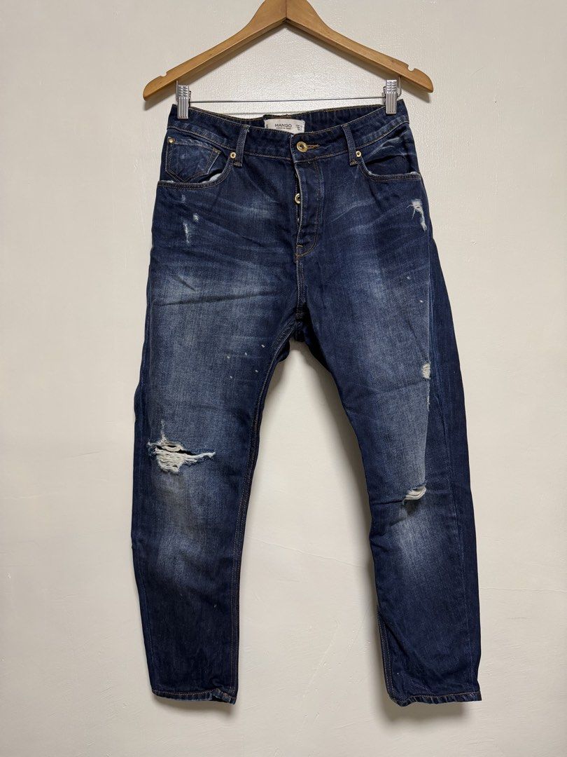Mango Dark Wash Distressed Denim Jeans (Category: Jeans) located in Manila. Submitted by don_p (Listing ID 1463868558, Image 2). Description: EU: 40 US: 8 - Brand: Mango - Color: Dark Wash Denim - Style: Distressed with rips and paint splatters - Closure: Button fly - Fit: Straight leg - Occasion: Casual wear.