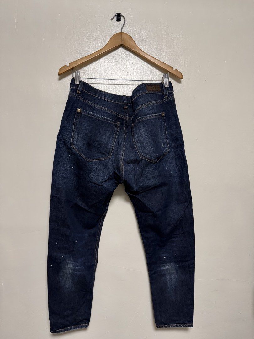 Mango Dark Wash Distressed Denim Jeans (Category: Jeans) located in Manila. Submitted by don_p (Listing ID 1463868558, Image 1). Description: EU: 40 US: 8 - Brand: Mango - Color: Dark Wash Denim - Style: Distressed with rips and paint splatters - Closure: Button fly - Fit: Straight leg - Occasion: Casual wear.