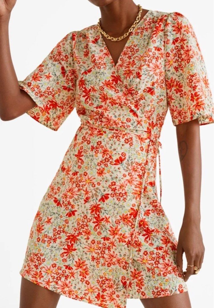 Mango Floral Wrap Dress XS (Category: Dresses) located in Baguio. Submitted by tresmariascloset13 (Listing ID 1462073220, Image 2). Description: - Cute floral wrap dress from MNG - Short flutter sleeves - Tie waist for adjustable fit - Lightweight and breathable fabric .