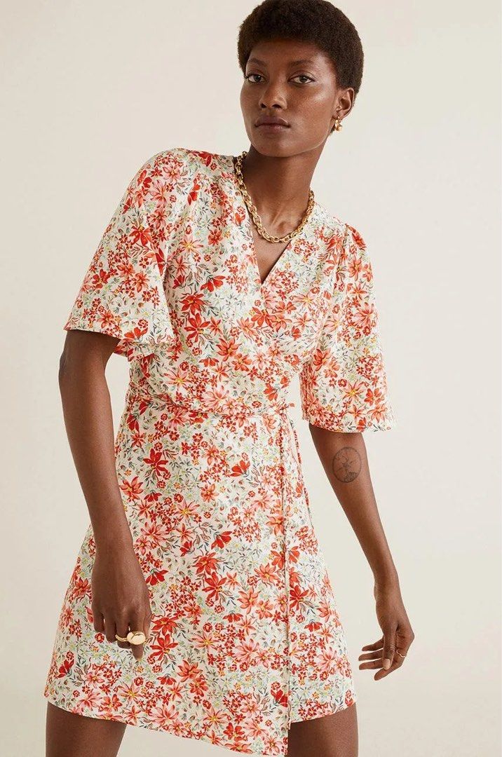 Mango Floral Wrap Dress XS (Category: Dresses) located in Baguio. Submitted by tresmariascloset13 (Listing ID 1462073220, Image 1). Description: - Cute floral wrap dress from MNG - Short flutter sleeves - Tie waist for adjustable fit - Lightweight and breathable fabric .