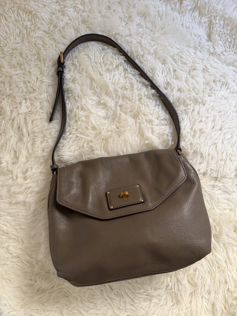 Marc by Marc Jacobs Grey Leather Shoulder Bag (Category: Luxury Bags & Wallets) located in Cebu City. Submitted by gdcebu (Listing ID 1463923821, Image 1). Description: - auth Marc by Marc Jacobs shoulder bag - Soft, grey pebbled leather - Elegant gold hardware details - Spacious main compartment - Interior zip pocket for essentials - Adjustable strap for comfortable wear - Ideal everyday bag.