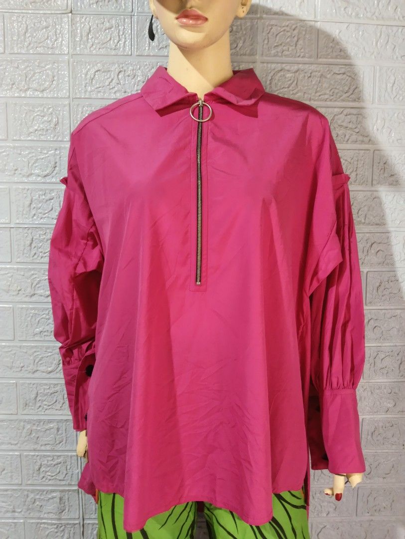 Marni Pink Oversized Zip Collar Shirt (Category: Shirts) located in Davao. Submitted by noelamihan05424 (Listing ID 1463819188, Image 1). Description: - Pink Marni shirt - Oversized fit - Zip collar with ring pull - Balloon sleeves with elasticated cuffs - Made in Italy - Size 40 - XXL fit - Dimes 24x27 (Back Length 32) - Perfect statement piece.