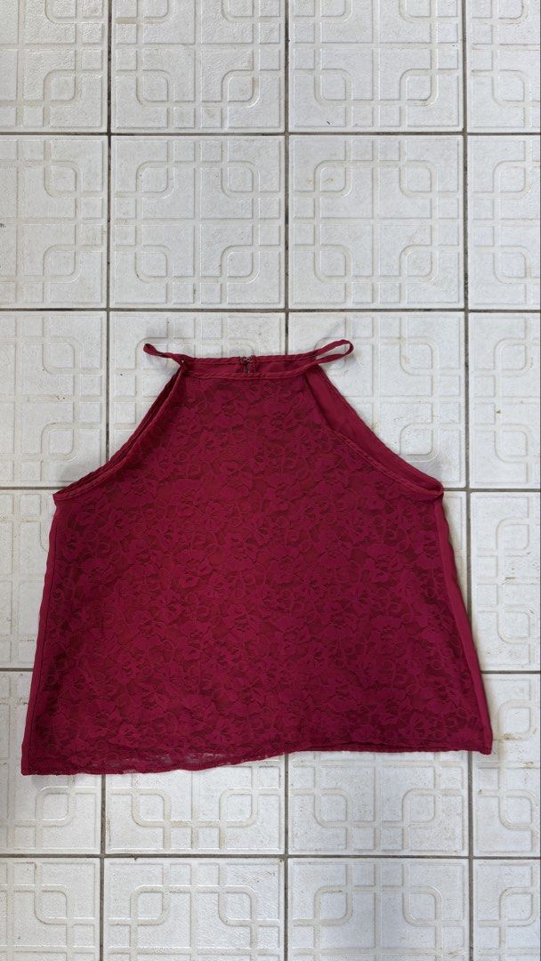Maroon Lace Halter Neck Top (Category: Sleeveless) located in Manila. Submitted by bubbles.dan (Listing ID 1463769684, Image 1). Description: - Chic maroon halter neck top - Elegant lace overlay on the front - Stylish keyhole detail at the back - Secure zipper closure - Ideal for night outs and special occasions - Comfortable and fashionable.
