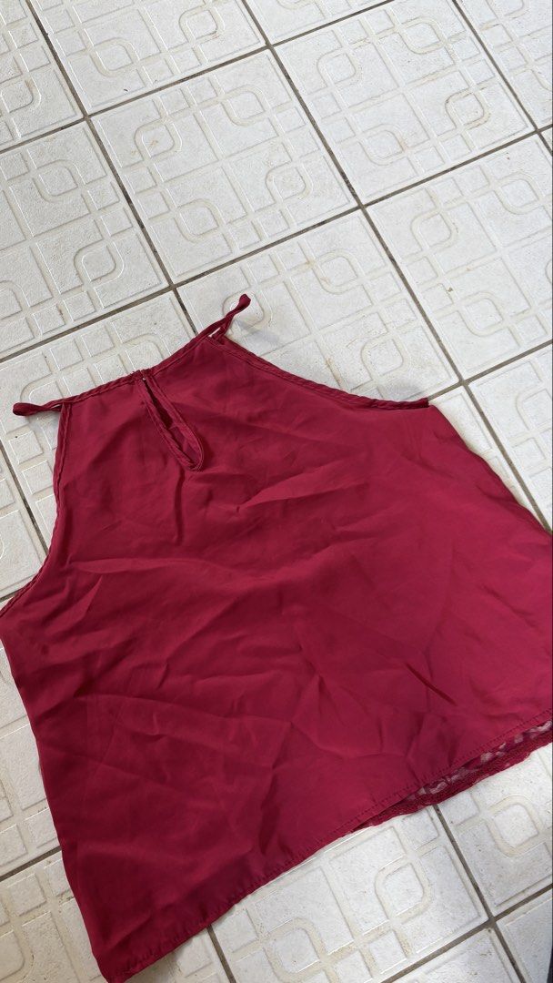 Maroon Lace Halter Neck Top (Category: Sleeveless) located in Manila. Submitted by bubbles.dan (Listing ID 1463769684, Image 3). Description: - Chic maroon halter neck top - Elegant lace overlay on the front - Stylish keyhole detail at the back - Secure zipper closure - Ideal for night outs and special occasions - Comfortable and fashionable.