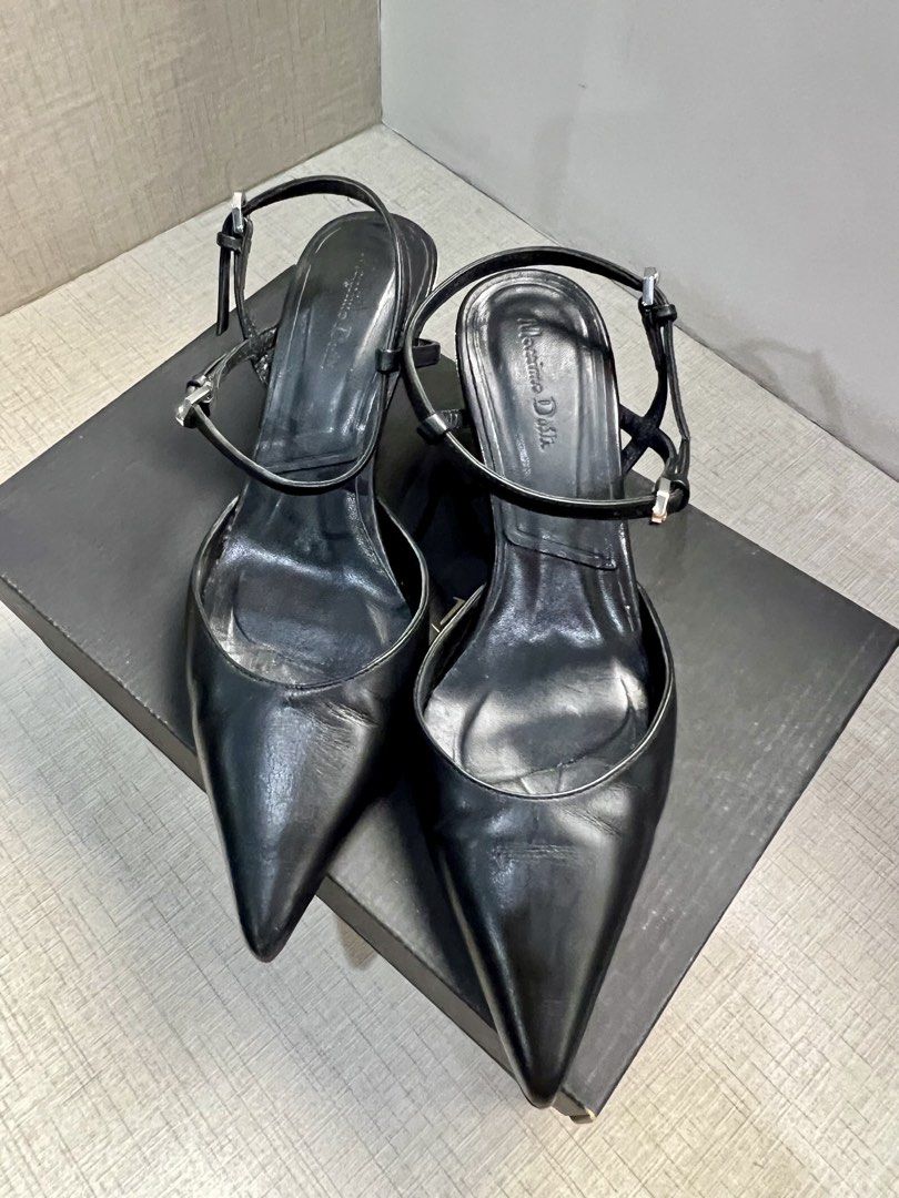 Massimo Dutti Pointed Toe Slingback Heels (Category: Heels) located in Quezon City. Submitted by fromkimwithless (Listing ID 1463843058, Image 2). Description: - Brand: Massimo Dutti - Style: Black Leather Slingback Heels - Size: US 6.5 - Features: Pointed toe, thin ankle strap - Heel Height: 2inches (suitable for everyday wear) - Includes: Original box and dust bag - Purchased: Greenbelt in 2023.