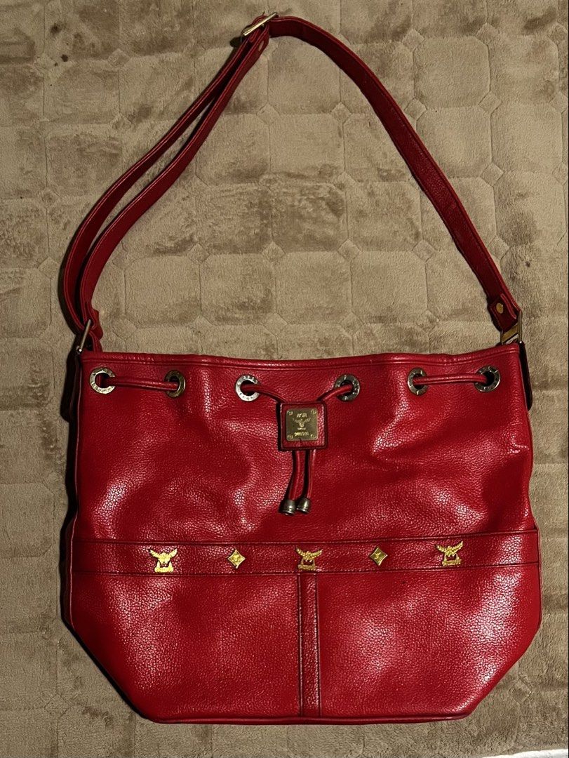 MCM Red Leather Drawstring Bucket Bag (Category: Luxury Bags & Wallets) located in Manila. Submitted by pokenor111 (Listing ID 1463867323, Image 1). Description: .