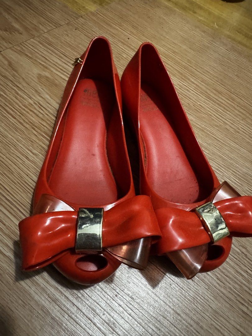 Melissa Jelly Flats Red Bow Size 30 (Category: Flats & Sandals) located in Manila. Submitted by missgrace_collection (Listing ID 1463938010, Image 1). Description: - Red Melissa jelly flats - Made in Brazil - Size 30 (EU 12/13) - Cute bow detail - Minor signs of wear on soles and insoles - Plenty of life left, perfect for everyday or rainy days.