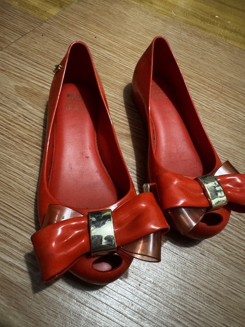 Melissa Jelly Flats Red Bow Size 30 (Category: Flats & Sandals) located in Manila. Submitted by missgrace_collection (Listing ID 1463938010, Image 3). Description: - Red Melissa jelly flats - Made in Brazil - Size 30 (EU 12/13) - Cute bow detail - Minor signs of wear on soles and insoles - Plenty of life left, perfect for everyday or rainy days.