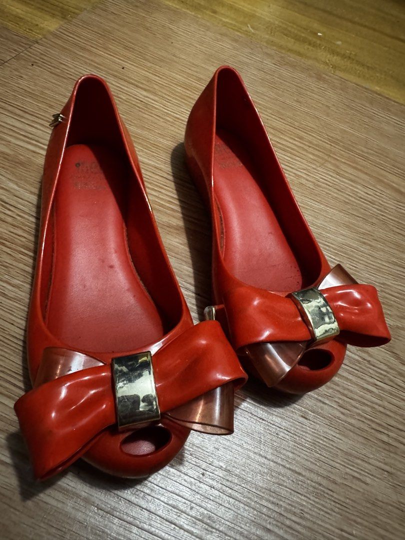 Melissa Jelly Flats Red Bow Size 30 (Category: Flats & Sandals) located in Manila. Submitted by missgrace_collection (Listing ID 1463938010, Image 2). Description: - Red Melissa jelly flats - Made in Brazil - Size 30 (EU 12/13) - Cute bow detail - Minor signs of wear on soles and insoles - Plenty of life left, perfect for everyday or rainy days.
