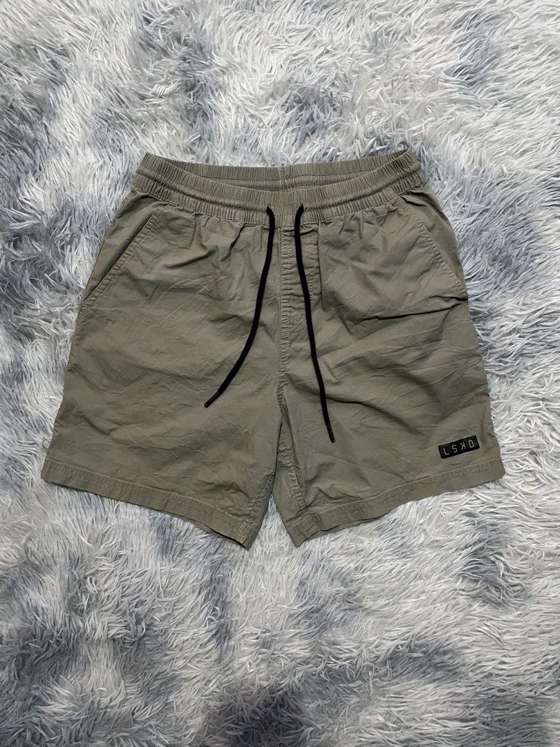 Men's LSKD Daily Shorts 7" (Category: Shorts) located in Carmen. Submitted by yawbuangaka (Listing ID 1463797056, Image 2). Description: These are the LSKD Daily Shorts in an dust olive shade, featuring an elastic drawstring waistband and a small black logo patch near the hem. •Small •Waistline - 30 •Length - 16 •In very good condition.