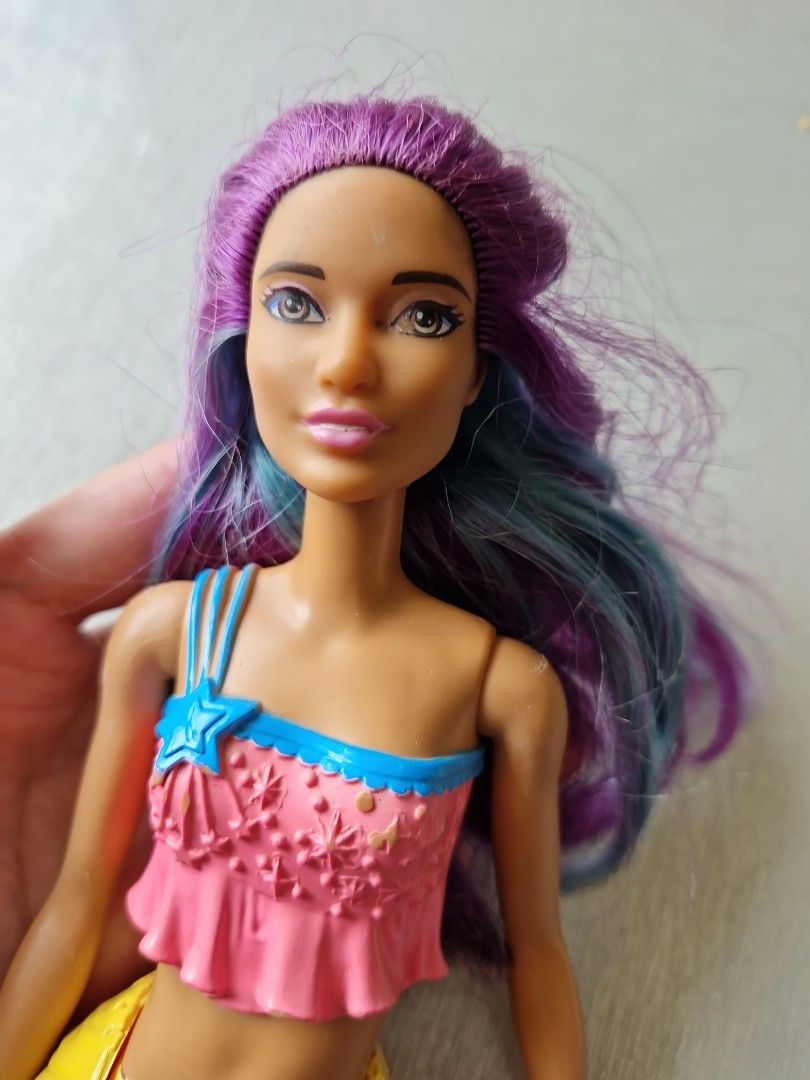 Mermaid barbie (Category: Kids Toys) located in Quezon City. Submitted by declttermum (Listing ID 1463747679, Image 3). Description: Preloved mermaid barbie. Take both. Wysiwyg. Available by December. #barbie #mermaidbarbie.