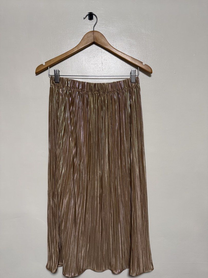 Metallic Pleated Midi Skirt (Category: Skirts) located in Manila. Submitted by don_p (Listing ID 1463866674, Image 2). Description: M to L - Shimmering midi skirt - Pleated design - Comfortable elastic waistband - Beautiful metallic fabric that catches the light - Versatile: dress up with heels or down with sneakers.
