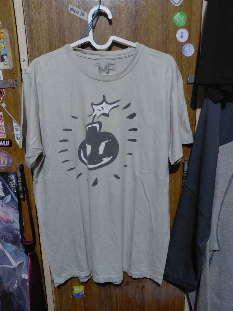 MF DOOM Scott Pilgrim vs. The World T-Shirt (Category: Shirts) located in Imus. Submitted by frootiloots4103 (Listing ID 1463750786, Image 1). Description: - MF DOOM Scott Pilgrim vs. The World graphic tee - Features the iconic bomb design - Tag size: Large - Material: Comfortable cotton - Ideal for fans of the movie or comic Large can fit XL OPEN FOR NEGO (best if aspack) 📍Imus, Cavite 4103 Can do meetups within Imus Area 🚚 J&T or Lalamove 📨 