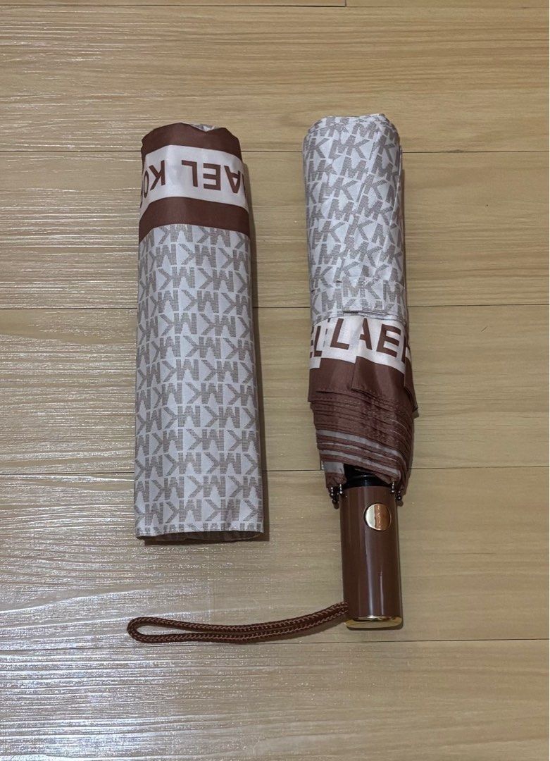 Michael Kors Automatic Umbrella (Category: Umbrellas) located in Quezon City. Submitted by beckyshop2024 (Listing ID 1463875160, Image 1). Description: - Brand new - Original from US - Vanilla / Monogram.