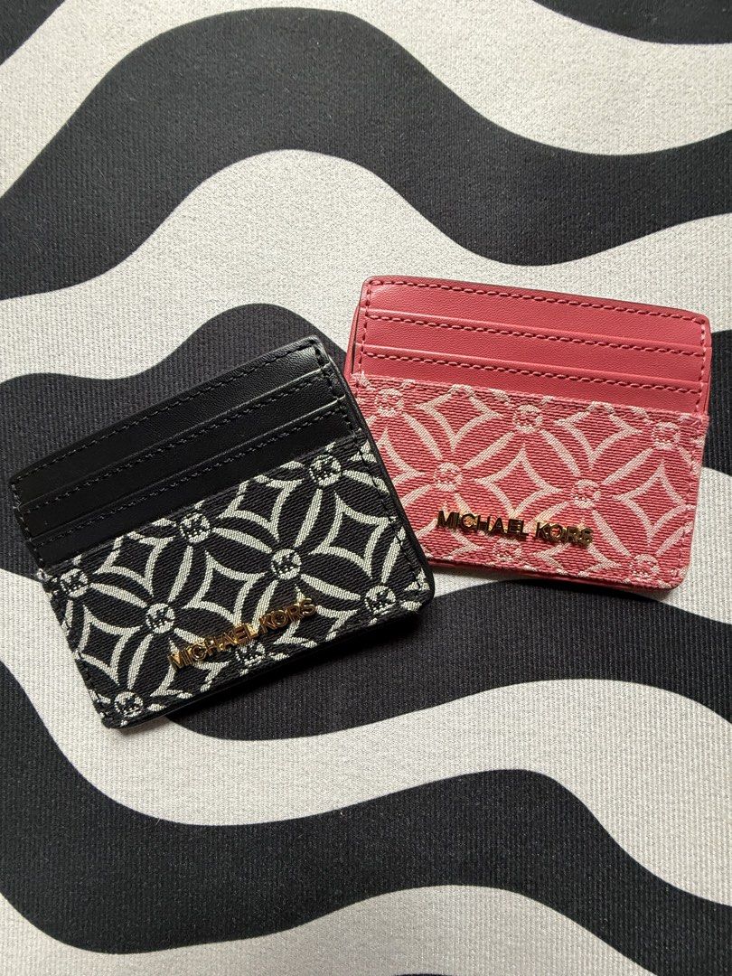 Michael Kors Jet Set Cardholder (Category: Wallets & Card holders) located in Baguio. Submitted by mooi.kuryba (Listing ID 1463906608, Image 1). Description: MK Jet Set Card Holder 🪪 Brand New | Original L 8 cm x W 10.5 cm 📏 5 card/ID slot/holder 1 pc berry sorbet 💕 1 pc black 🖤 @1,250 PHP each Message us for orders! 📲 #michaelkors #cardholder #mooikuryba.