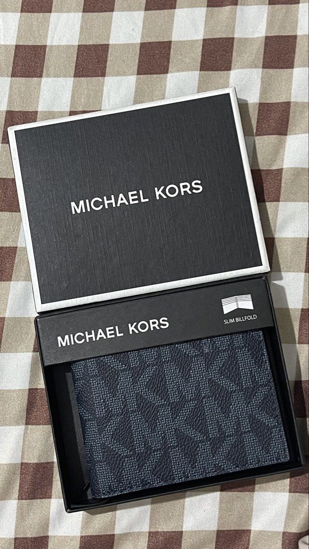 Michael Kors Slim Bifold Mens Wallet (Category: Wallets & Card Holders) located in Quezon City. Submitted by koichronicles (Listing ID 1463809317, Image 1). Description: 💯Authentic Michael Kors Slim Bifold Wallet for Men 📌Comes in original Michael Kors box 📌Guaranteed authentic, purchased directly from the US 📌 6 card slots with 2 extra side slots.