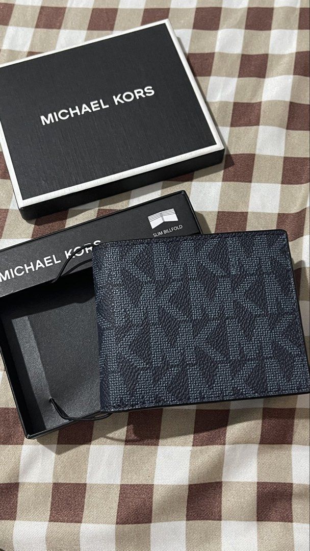 Michael Kors Slim Bifold Mens Wallet (Category: Wallets & Card Holders) located in Quezon City. Submitted by koichronicles (Listing ID 1463809317, Image 3). Description: 💯Authentic Michael Kors Slim Bifold Wallet for Men 📌Comes in original Michael Kors box 📌Guaranteed authentic, purchased directly from the US 📌 6 card slots with 2 extra side slots.