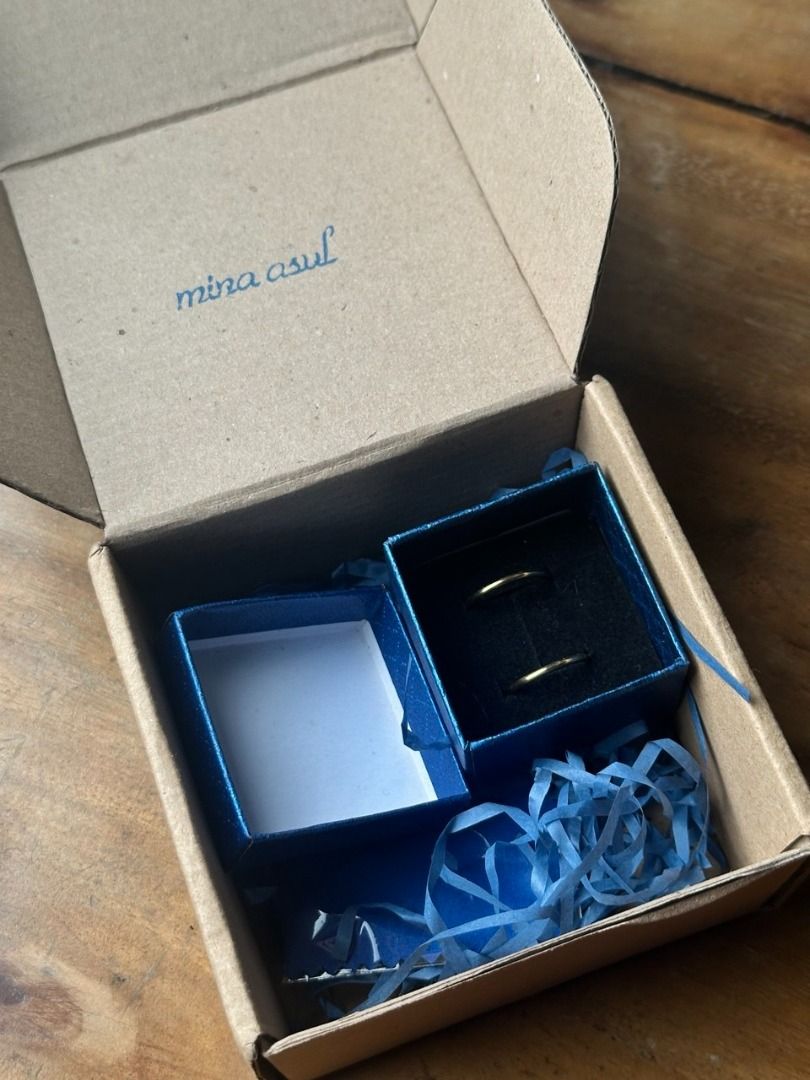 Mina Asul Rama Brass Ring Set US6.5 (Category: Rings) located in Manila. Submitted by cion007 (Listing ID 1463803182, Image 3). Description: ⚠️ Please read the full description before buying ⚠️ → Selling for the same price I bought from their website → Comes with the original packaging and cloth → RFS: Bought the wrong pair Description: 2" Slim Round Rings; Symbolizing the sun and the moon — made to move together. MOP: Gcash/Maya/UnionBank/Securi