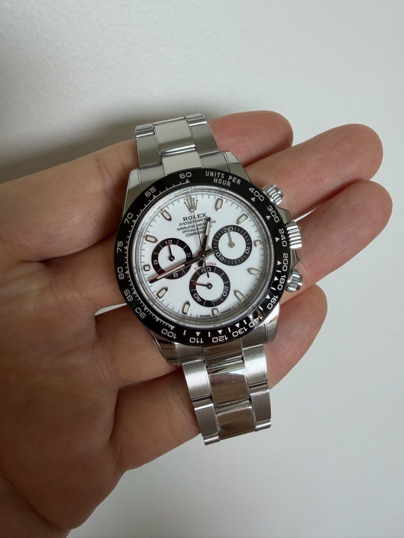 Mint 2022 Aug Rolex Daytona Stainless Steel Daytona 116500LN "White / Panda" (Category: Watches) located in Singapore. Submitted by jay.z. (Listing ID 1463783112, Image 1). Description: Brand: Rolex Model number: 116500LN Dial Color: White Condition: Mint Condition Case size: 40mm Case material: Oyster Steel Movement type: Automatic Movement: Calibre 4130 Clasp: Folding Oysterlock safety clasp with Easylink Accessories: Box w Warranty Card & Book