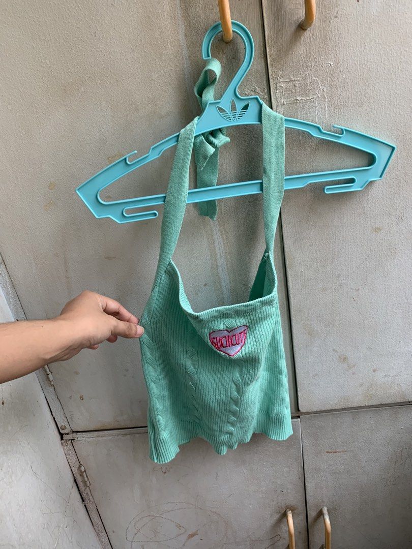 Mint Green Knit Halter Top with Heart Patch (Category: Sleeveless) located in Manila. Submitted by usagichan_rabbit (Listing ID 1463782754, Image 1). Description: - Mint green knit halter top - Cable knit design - Pink heart patch with 'SUICID' text - Ties at neck and back - Very stretchy material - Perfect for casual or going-out outfits.
