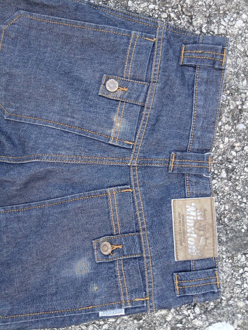 Minxton Denim Jeans jorts (Category: Shorts) located in Caloocan City. Submitted by answery (Listing ID 1463837629, Image 1). Description: - Classic blue wash denim shorts - Contrasting orange stitching for a stylish detail - Two functional front pockets - Two buttoned back pockets for secure storage - Secure button and zip fly closure - Ideal for everyday casual wear.
