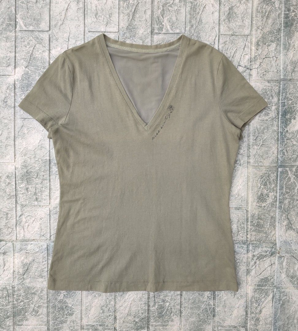 Miss Sixty Olive Green Sequined "SIXTY" T-shirt (Category: Shirts) located in Bayambang. Submitted by mon10192816 (Listing ID 1463751925, Image 1). Description: - Width 18 - Length 23¼ - Olive green V-neck t-shirt by Miss Sixty. - "SIXTY" spelled out in vibrant sequins on the back. - Small rose and script logo on the front left chest. - Made from a comfortable cotton blend. - Perfect for a stylish casual outfit..