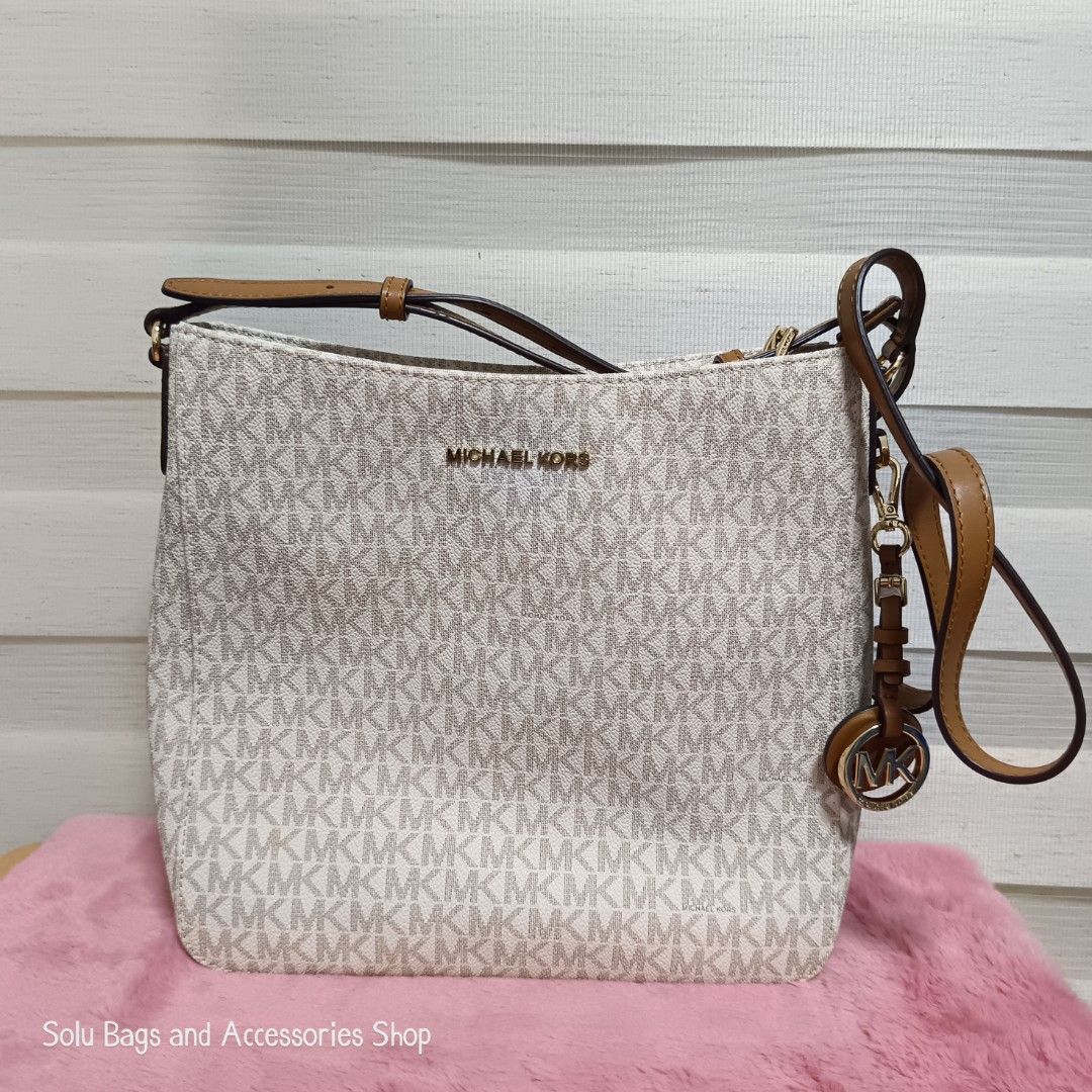 MK JetSet Travel Messenger Bag (Category: Cross-body Bags) located in Taguig. Submitted by mommasolu (Listing ID 1463804836, Image 2). Description: ❣️On hand and ready to ship ❣️All items are original and authentic from 🇺🇸 Shipping: J&T or Laz check out ‼️Same Day Shipping via GrabExpress or Lalamove for Metro Manila (payment first) ‼️COD option available for Laz check out MOP: GCash and Bank Transfer via BPI or GoTyme.