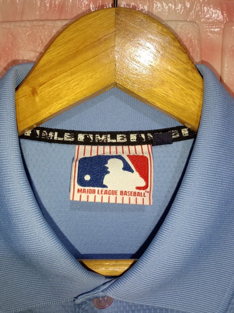 MLB LA Dodgers Polo shirt (Category: Tshirts & Polo Shirts ) located in Davao. Submitted by ayeeasyshop13 (Listing ID 1463893926, Image 3). Description: This is a powder blue Los Angeles Dodgers polo shirt featuring the print team logo on the chest. As new condition Size medium on tag Dimension 21/28 500 + SF.