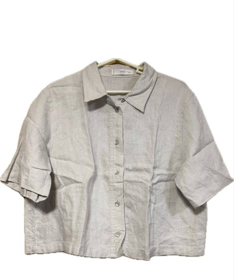 MNG Linen Blend Short Sleeve Shirt (Category: Shirts) located in Manila. Submitted by chelleff (Listing ID 1463820176, Image 1). Description: - MNG shirt - Linen blend fabric - Short sleeves - Button-up front - Classic shirt collar - Relaxed fit - Ideal for casual wear.