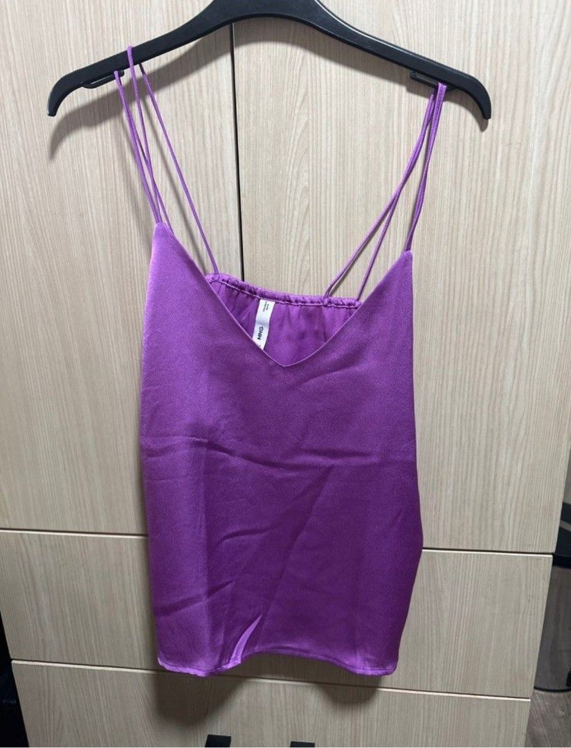 MNG Purple Satin Cami Top (Category: Sleeveless) located in Manila. Submitted by dbelle1030 (Listing ID 1463801334, Image 1). Description: - MNG purple satin cami top - Size: Medium (M) - Features spaghetti straps - V-neckline - Beautiful satin sheen - Perfect for layering or wearing on its own.