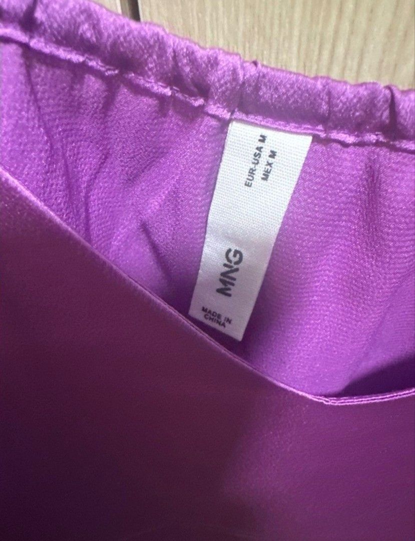 MNG Purple Satin Cami Top (Category: Sleeveless) located in Manila. Submitted by dbelle1030 (Listing ID 1463801334, Image 2). Description: - MNG purple satin cami top - Size: Medium (M) - Features spaghetti straps - V-neckline - Beautiful satin sheen - Perfect for layering or wearing on its own.