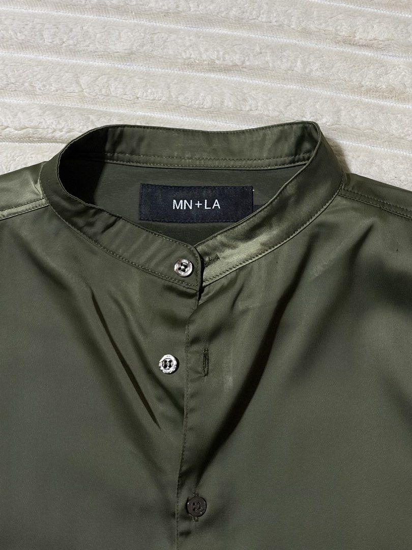 MN+LA Mandarin Shirt SS XL (Category: Tshirts & Polo Shirts ) located in Bacolod City. Submitted by simulasawala (Listing ID 1463833015, Image 1). Description: - Olive green short sleeve shirt - Brand: MN+LA - Style: Band collar, button-up front - Material: Silky - Versatile: Suitable for casual or dressed-up looks - Important: Please check the size chart for accurate measurements.