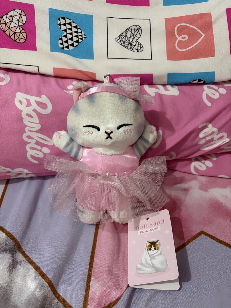 Mofusand Pink Tutu/Ballet Cat Plush Charm (Category: Plushies & Soft Toys) located in Manila. Submitted by milliemei (Listing ID 1463826570, Image 2). Description: - Adorable Molsand cat plush toy - Features a charming pink ballerina tutu - Cute bow accessory on its head - Brand new with tag still attached - Ideal for collectors or as a thoughtful gift Price still negotiable.