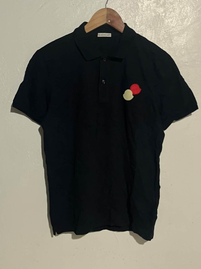Moncler Authentic Navy Polo Shirt (Category: Tshirts & Polo Shirts ) located in Maasin. Submitted by trippythirftyyy (Listing ID 1463878846, Image 1). Description: - Classic Navy Blue Moncler polo shirt -Size small -width:19 -Length:24 - Features iconic three-circle logo on chest - Made in Turkey - Button closure at the neck - Versatile for casual or smart-casual wear -Complete tags .