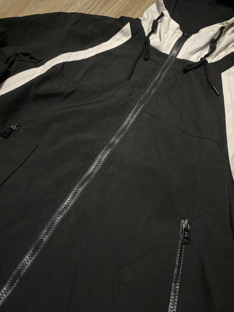 Moncler Black White Striped Hooded Jacket (Category: Coats, Jackets and Outerwear) located in Caloocan City. Submitted by andreiresu72657 (Listing ID 1463893157, Image 2). Description: - Moncler black hooded jacket - White stripe detailing - Full zip closure - Two front zip pockets - Signature Moncler logo patch on sleeve - Made with quality materials - Ideal for layering.