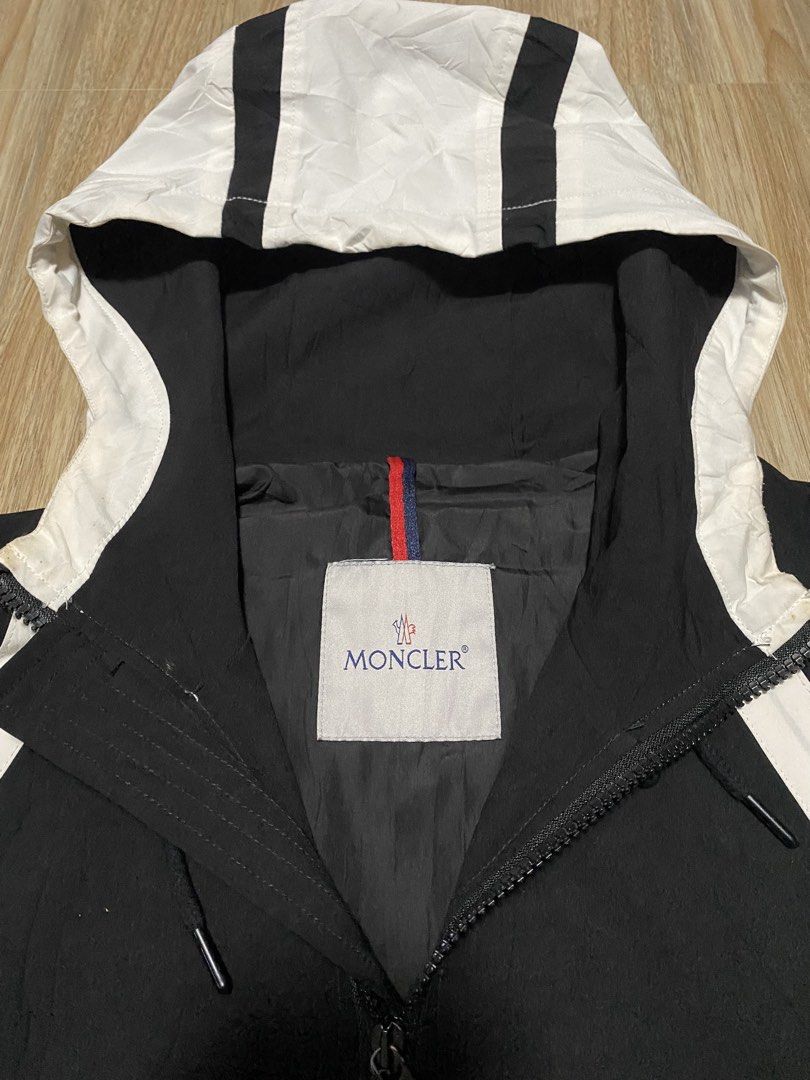 Moncler Black White Striped Hooded Jacket (Category: Coats, Jackets and Outerwear) located in Caloocan City. Submitted by andreiresu72657 (Listing ID 1463893157, Image 3). Description: - Moncler black hooded jacket - White stripe detailing - Full zip closure - Two front zip pockets - Signature Moncler logo patch on sleeve - Made with quality materials - Ideal for layering.