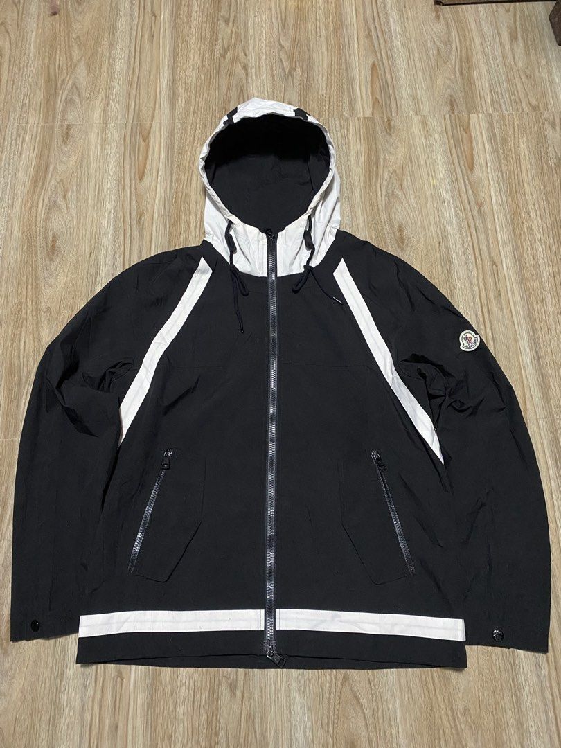 Moncler Black White Striped Hooded Jacket (Category: Coats, Jackets and Outerwear) located in Caloocan City. Submitted by andreiresu72657 (Listing ID 1463893157, Image 1). Description: - Moncler black hooded jacket - White stripe detailing - Full zip closure - Two front zip pockets - Signature Moncler logo patch on sleeve - Made with quality materials - Ideal for layering.