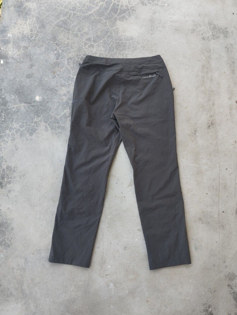 Montbell Hiking Pants M-S Grey (Category: Trousers) located in Mati. Submitted by old_era.ph (Listing ID 1463788393, Image 2). Description: - Montbell Hiking Pants - Color: Grey - Size: M-S - Features: Built-in belt, zippered pockets, elasticated waist with drawstring - Material: Lightweight and durable - Ideal for: Outdoor activities, trekking, casual wear - Branding: Montbell logo on the back.